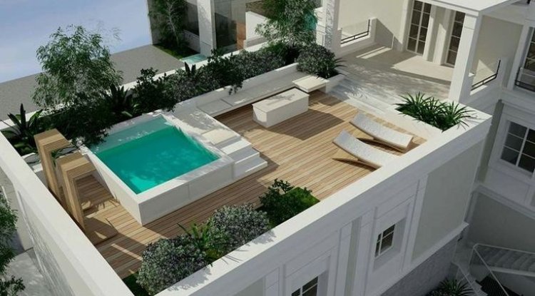 Desain rumah tanah dengan atap besar dan lebar untuk melindungi dinding